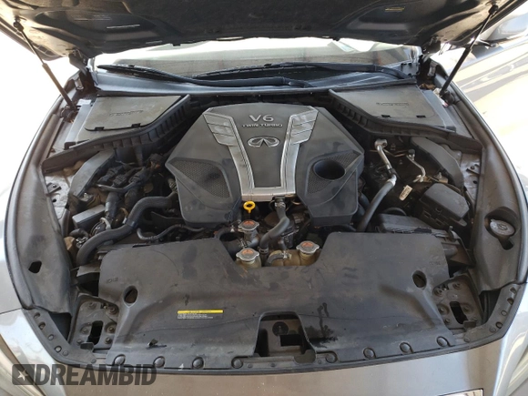 2016 Infiniti Q50 Premium with VIN JN1EV7AP0GM300476, listed as a Copart auction lot 50693634 with 116,025 mi miles and Salvage Title. Bid and sale history available at DreamBid. Image 12.