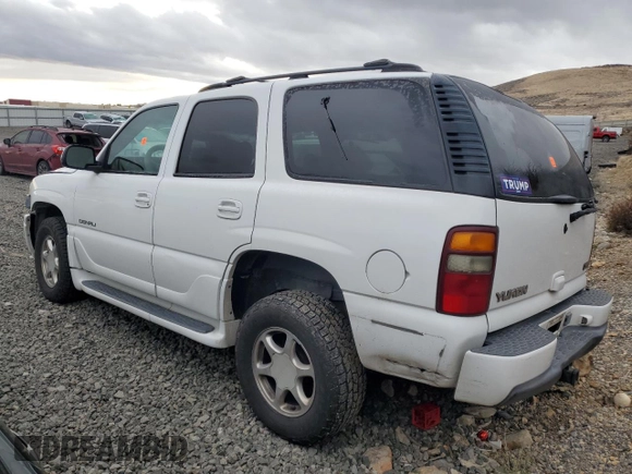 2001 GMC Yukon Denali z VIN 1GKEK63U01J287101, wystawiony jako Copart lot #43659115 z przebiegiem Nie podano mil oraz Szkoda całkowita • Salvage title. Historia ofert i sprzedaży dostępna na DreamBid. Obrazek 2.