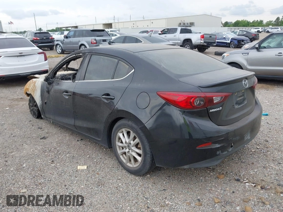 2014 Mazda 3 i Touring z VIN JM1BM1V71E1215932, wystawiony jako IAAI lot #42138164 z przebiegiem Nie podano mil oraz . Historia ofert i sprzedaży dostępna na DreamBid. Obrazek 3.