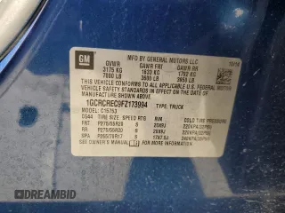 2015 Chevrolet Silverado 1500 LT with VIN 1GCRCREC9FZ173994, listed as a Copart auction lot 77023834 with 107,624 mi miles and Salvage Title. Bid and sale history available at DreamBid. Image 12.
