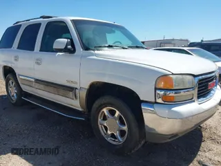 2002 GMC Yukon SLT with VIN 1GKEK13T52R262756, listed as a IAAI auction lot 41819746 with 1 mi miles. Bid and sale history available at carsss.com. Image 1.