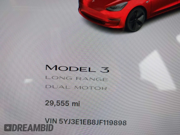 2018 Tesla Model 3 Long Range Battery z VIN 5YJ3E1EB8JF119898, wystawiony jako IAAI lot #42297445 z przebiegiem 29 555 mil mil oraz . Historia ofert i sprzedaży dostępna na DreamBid. Obrazek 7.