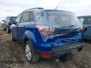 2017 Ford Escape SE with VIN 1FMCU9GD9HUE11122, listed as a IAAI auction lot 39049615 with 130,865 mi miles and . Bid and sale history available at DreamBid. Image 3.