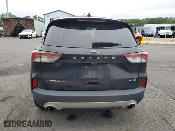 2021 Ford Escape Titanium with VIN 1FMCU9J97MUA58524, listed as a Copart auction lot 61045765 with 91,575 mi miles and Clean title. Bid and sale history available at DreamBid. Image 6.