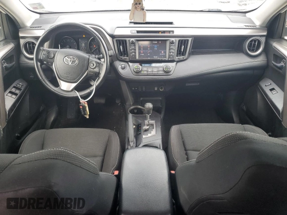 2018 Toyota RAV4 XLE with VIN JTMWFREV0JJ204150, listed as a Copart auction lot 59610825 with 34,730 mi miles and Salvage title. Bid and sale history available at DreamBid. Image 8.