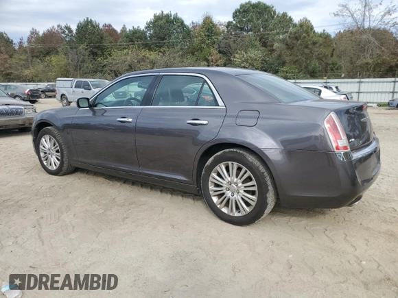 2014 Chrysler 300 C with VIN 2C3CCAKT6EH109281, listed as a Copart auction lot 79534984 with 183,148 mi miles and Salvage Title. Bid and sale history available at DreamBid. Image 2.