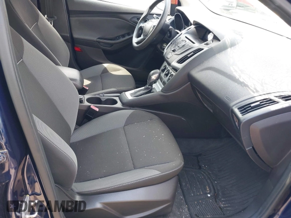 2012 Ford Focus SE z VIN 1FAHP3F22CL157417, wystawiony jako IAAI lot #42655527 z przebiegiem 107 472 mil mil oraz . Historia ofert i sprzedaży dostępna na DreamBid. Obrazek 5.