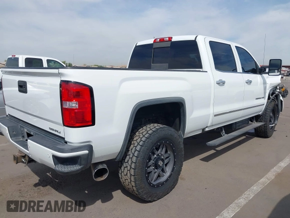 2016 GMC Sierra 2500HD Denali z VIN 1GT12UE88GF170375, wystawiony jako IAAI lot #41885873 z przebiegiem 150 108 mil mil oraz . Historia ofert i sprzedaży dostępna na DreamBid. Obrazek 4.
