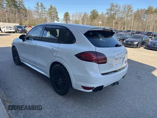 2013 Porsche Cayenne GTS with VIN WP1AD2A22DLA78738, listed as a IAAI auction lot 41816214 with 155,455 mi miles and . Bid and sale history available at DreamBid. Image 3.