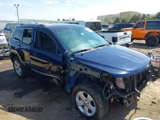 2013 Jeep Grand Cherokee Laredo with VIN 1C4RJEAG9DC621061, listed as a IAAI auction lot 41846537 with 107,264 mi miles. Bid and sale history available at carsss.com. Image 1.
