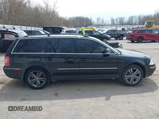 2005 Volkswagen Passat GLS z VIN WVWCE63B15E131558, wystawiony jako IAAI lot #42069590 z przebiegiem 241 886 mil mil oraz . Historia ofert i sprzedaży dostępna na DreamBid. Obrazek 13.