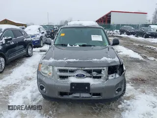 2012 Ford Escape XLS z VIN 1FMCU9C72CKA10130, wystawiony jako IAAI lot #41543233 z przebiegiem 168 552 mil mil oraz . Historia ofert i sprzedaży dostępna na DreamBid. Obrazek 12.