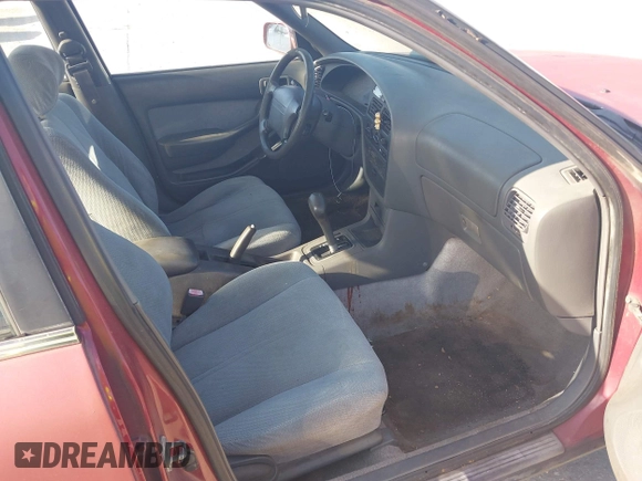 1995 Toyota Camry LE z VIN JT2SK12E6S0318069, wystawiony jako IAAI lot #42003618 z przebiegiem 235 623 mil mil oraz . Historia ofert i sprzedaży dostępna na DreamBid. Obrazek 5.