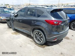 2016 Mazda CX-5 Grand Touring with VIN JM3KE4DY7G0643643, listed as a IAAI auction lot 42077497 with 120,343 mi miles. Bid and sale history available at carsss.com. Image 3.