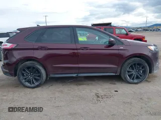 2021 Ford Edge SEL z VIN 2FMPK4J9XMBA59022, wystawiony jako IAAI lot #40596255 z przebiegiem 41 770 mil mil oraz . Historia ofert i sprzedaży dostępna na DreamBid. Obrazek 13.