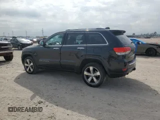2015 Jeep Grand Cherokee Overland with VIN 1C4RJFCT6FC628729, listed as a Copart auction lot 44979155 with 105,959 mi miles and Salvage Title. Bid and sale history available at DreamBid. Image 2.