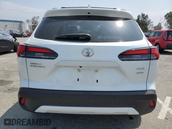 2024 Toyota Corolla Cross XLE with VIN 7MUDAABG4RV105641, listed as a Copart auction lot 58950855 with 5,805 mi miles and Salvage title. Bid and sale history available at DreamBid. Image 6.