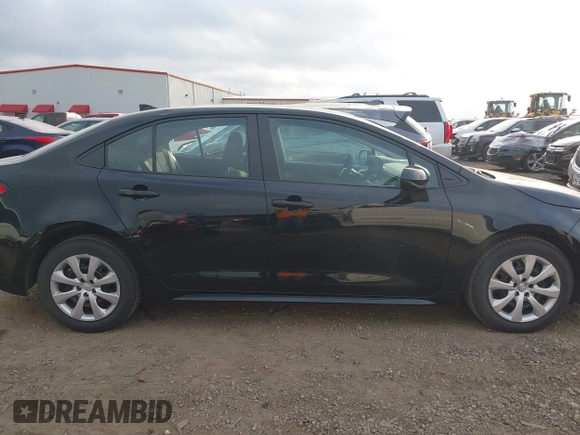 2023 Toyota Corolla LE with VIN 5YFB4MDE0PP067417, listed as a IAAI auction lot 42144017 with 51,652 mi miles. Bid and sale history available at carsss.com. Image 13.