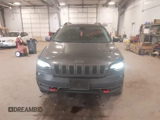 2020 Jeep Cherokee Trailhawk z VIN 1C4PJMBX8LD627104, wystawiony jako IAAI lot #41493732 z przebiegiem 46 463 mil mil oraz . Historia ofert i sprzedaży dostępna na DreamBid. Obrazek 12.