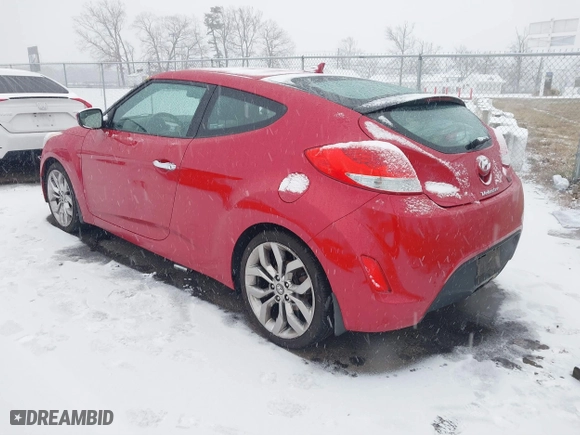 2014 Hyundai Veloster with VIN KMHTC6AD8EU214612, listed as a IAAI auction lot 41258820 with 61,984 mi miles. Bid and sale history available at carsss.com. Image 3.