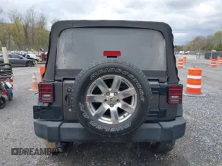 2018 Jeep Wrangler JK Unlimited Sport S with VIN 1C4BJWDG8JL895981, listed as a IAAI auction lot 42048316 with 95,457 mi miles. Bid and sale history available at carsss.com. Image 15.