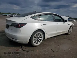2022 Tesla Model 3 Long Range z VIN 5YJ3E1EB5NF290131, wystawiony jako Copart lot #61128624 z przebiegiem 57 274 mil mil oraz Szkoda całkowita • Salvage title. Historia ofert i sprzedaży dostępna na DreamBid. Obrazek 3.