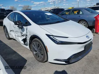 2023 Toyota Prius LE with VIN JTDACAAUXP3012538, listed as a IAAI auction lot 41948103 with 33,338 mi miles and . Bid and sale history available at DreamBid. Image 1.