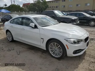 2015 BMW 4 Series 428i xDrive with VIN WBA4C9C53FG135314, listed as a Copart auction lot 82090253 with 93,188 mi miles and . Bid and sale history available at DreamBid. Image 4.