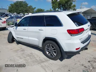 2020 Jeep Grand Cherokee Laredo with VIN 1C4RJFAG5LC258309, listed as a IAAI auction lot 42573007 with 68,980 mi miles and . Bid and sale history available at DreamBid. Image 3.