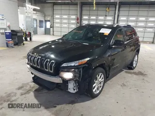 2015 Jeep Cherokee Latitude with VIN 1C4PJMCB5FW768854, listed as a IAAI auction lot 41246213 with 131,112 mi miles. Bid and sale history available at carsss.com. Image 6.