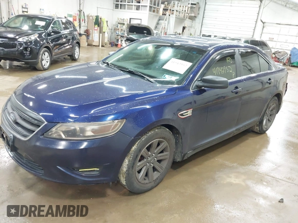 2011 Ford Taurus SE with VIN 1FAHP2DW4BG187235, listed as a IAAI auction lot 41942952 with 162,083 mi miles. Bid and sale history available at carsss.com. Image 2.