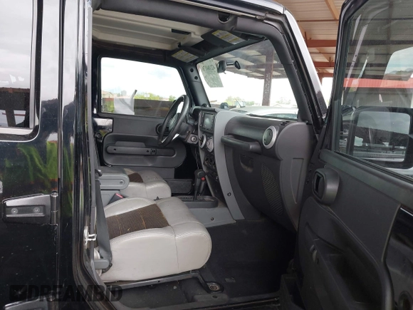 2008 Jeep Wrangler Unlimited Sahara with VIN 1J8GA59128L542384, listed as a IAAI auction lot 42184176 with 152,768 mi miles and . Bid and sale history available at DreamBid. Image 5.