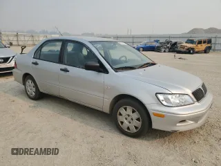 2002 Mitsubishi Lancer ES with VIN JA3AJ26E22U045919, listed as a Copart auction lot 63852225 with 184,071 mi miles and Salvage title. Bid and sale history available at DreamBid. Image 4.