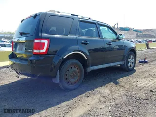 2009 Ford Escape Limited with VIN 1FMCU94G09KC03481, listed as a IAAI auction lot 42126118 with 167,446 mi miles. Bid and sale history available at carsss.com. Image 4.