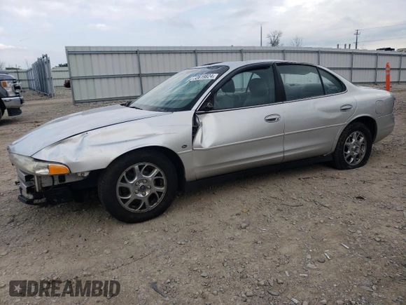 2000 Oldsmobile Intrigue GLS z VIN 1G3WX52H0YF233648, wystawiony jako Copart lot #72619824 z przebiegiem Nie podano mil oraz Nie do naprawy. Historia ofert i sprzedaży dostępna na DreamBid. Obrazek 1.