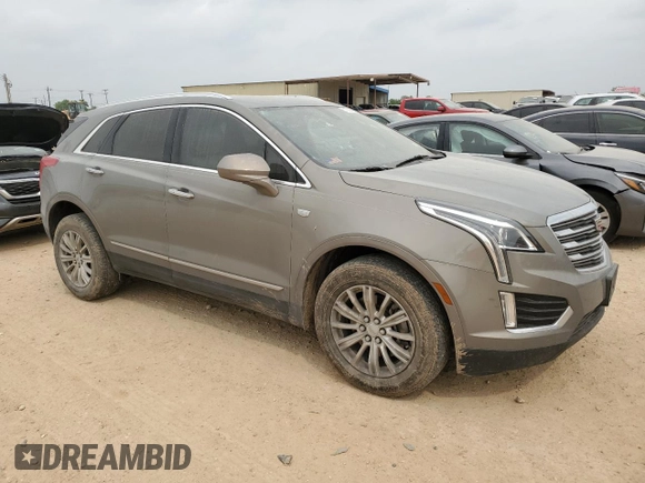 2019 Cadillac XT5 FWD with VIN 1GYKNARS9KZ107402, listed as a Copart auction lot 51352805 with 94,147 mi miles and Clean title. Bid and sale history available at DreamBid. Image 4.