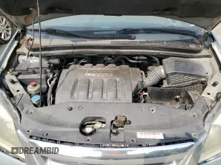 2006 Honda Odyssey EX z VIN 5FNRL38416B122268, wystawiony jako Copart lot #58969785 z przebiegiem 167 991 mil mil oraz Szkoda całkowita • Salvage title. Historia ofert i sprzedaży dostępna na DreamBid. Obrazek 12.