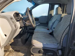 2005 Ford F-150 XL with VIN 1FTRF14W65NB91606, listed as a Copart auction lot 84889894 with 157,947 mi miles and Salvage Title. Bid and sale history available at carsss.com. Image 7.
