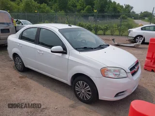 2011 Chevrolet Aveo 1LT z VIN KL1TD5DE8BB163191, wystawiony jako IAAI lot #42477653 z przebiegiem 114 076 mil mil oraz . Historia ofert i sprzedaży dostępna na DreamBid. Obrazek 1.