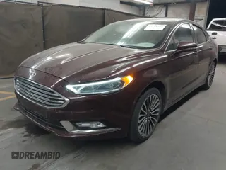 2017 Ford Fusion SE with VIN 3FA6P0H92HR105567, listed as a IAAI auction lot 42174324 with 123,443 mi miles and . Bid and sale history available at DreamBid. Image 2.
