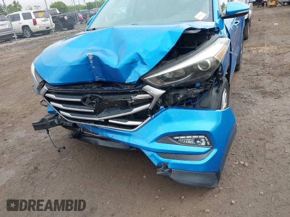 2017 Hyundai Tucson Sport z VIN KM8J33A23HU319048, wystawiony jako IAAI lot #42340603 z przebiegiem 51 738 mil mil oraz . Historia ofert i sprzedaży dostępna na DreamBid. Obrazek 6.