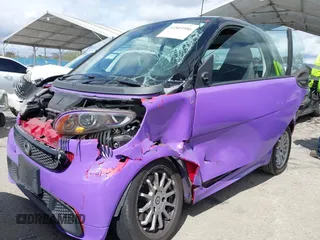 2013 Smart fortwo Pure with VIN WMEEJ3BA0DK686417, listed as a IAAI auction lot 41803956 with 83,850 mi miles. Bid and sale history available at carsss.com. Image 2.