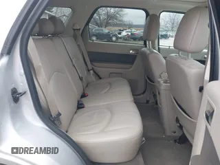 2009 Mercury Mariner Premier with VIN 4M2CU97719KJ15260, listed as a IAAI auction lot 41500367 with 104,063 mi miles. Bid and sale history available at carsss.com. Image 8.