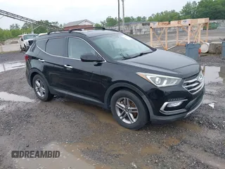 2017 Hyundai Santa Fe 2.4L z VIN 5NMZU3LB3HH011127, wystawiony jako IAAI lot #42369671 z przebiegiem 91 634 mil mil oraz . Historia ofert i sprzedaży dostępna na DreamBid. Obrazek 1.