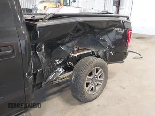 2015 Ford F-150 XLT with VIN 1FTFW1EF3FKD51350, listed as a IAAI auction lot 41413942 with 125,877 mi miles and . Bid and sale history available at carsss.com. Image 6.