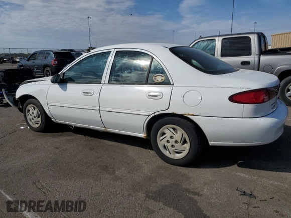 2002 Ford Escort Fleet Standard z VIN 3FAFP13P62R137425, wystawiony jako Copart lot #72697334 z przebiegiem 137 921 mil mil oraz Szkoda całkowita • Salvage title. Historia ofert i sprzedaży dostępna na DreamBid. Obrazek 2.