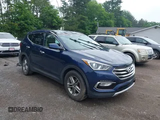 2017 Hyundai Santa Fe 2.4L z VIN 5XYZUDLB9HG421284, wystawiony jako IAAI lot #42441436 z przebiegiem 96 155 mil mil oraz . Historia ofert i sprzedaży dostępna na DreamBid. Obrazek 1.