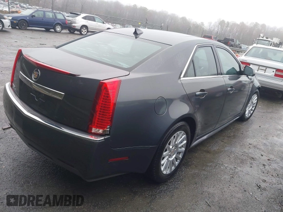 2012 Cadillac CTS with VIN 1G6DA5E56C0143588, listed as a IAAI auction lot 41416131 with 230,310 mi miles and . Bid and sale history available at DreamBid. Image 4.
