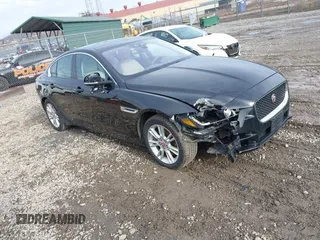 2017 Jaguar XE z VIN SAJAJ4BNXHA977865, wystawiony jako IAAI lot #41480578 z przebiegiem 117 917 mil mil oraz . Historia ofert i sprzedaży dostępna na DreamBid. Obrazek 1.