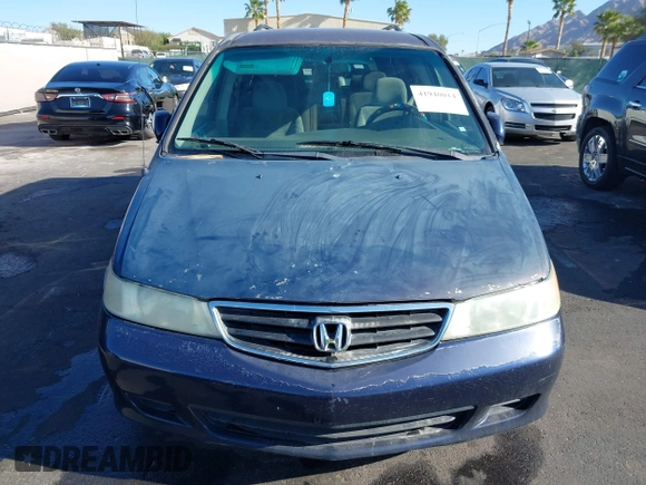 2004 Honda Odyssey EX z VIN 5FNRL18614B080980, wystawiony jako IAAI lot #41940014 z przebiegiem 233 465 mil mil oraz . Historia ofert i sprzedaży dostępna na DreamBid. Obrazek 12.